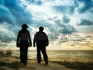 Senior Couple on the Beach at Sunset